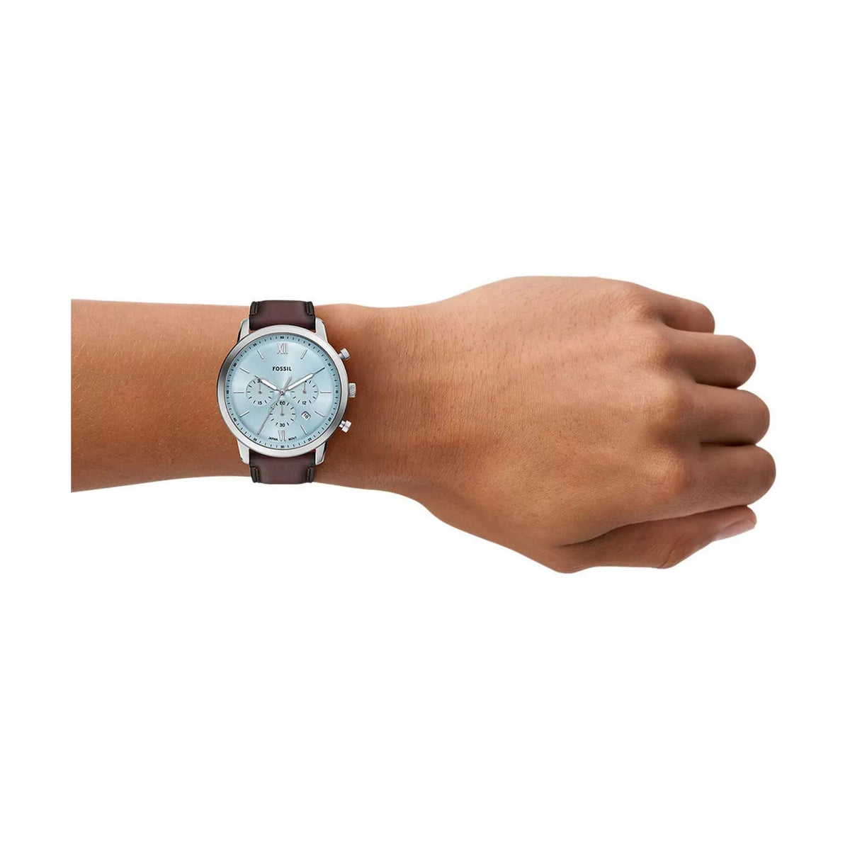 Men's chronograph watch on wrist, blue dial and brown leather strap