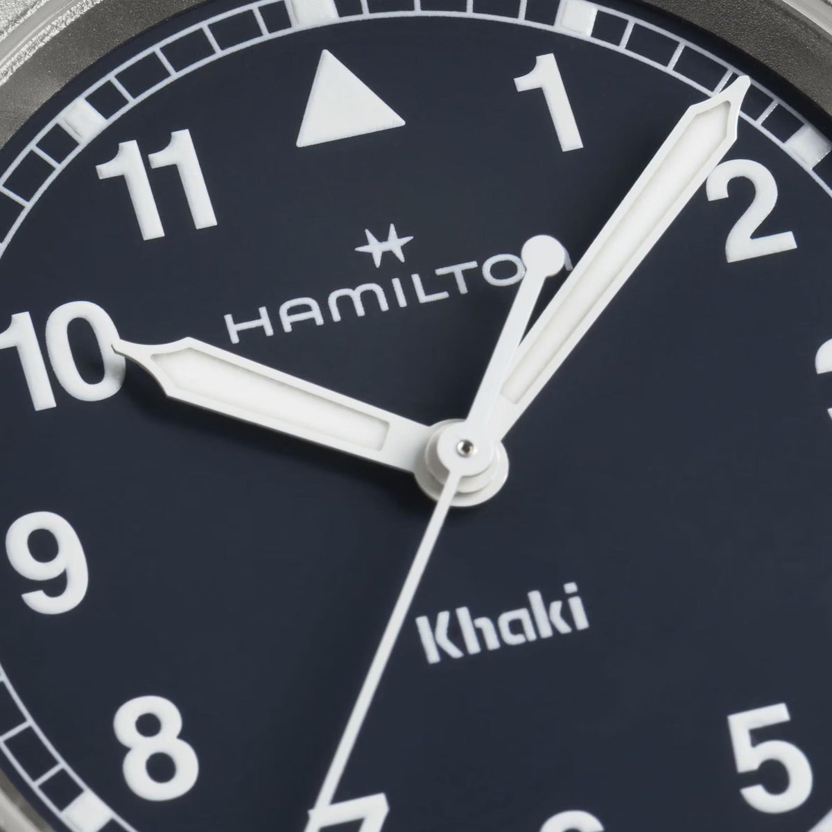 Hamilton H69301140 matte blue dial with Arabic numerals and luminous hands close-up