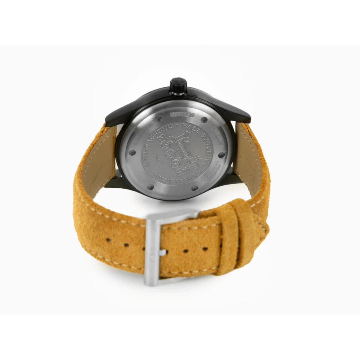 Men's automatic watch underside with metal caseback and tan leather strap with buckle
