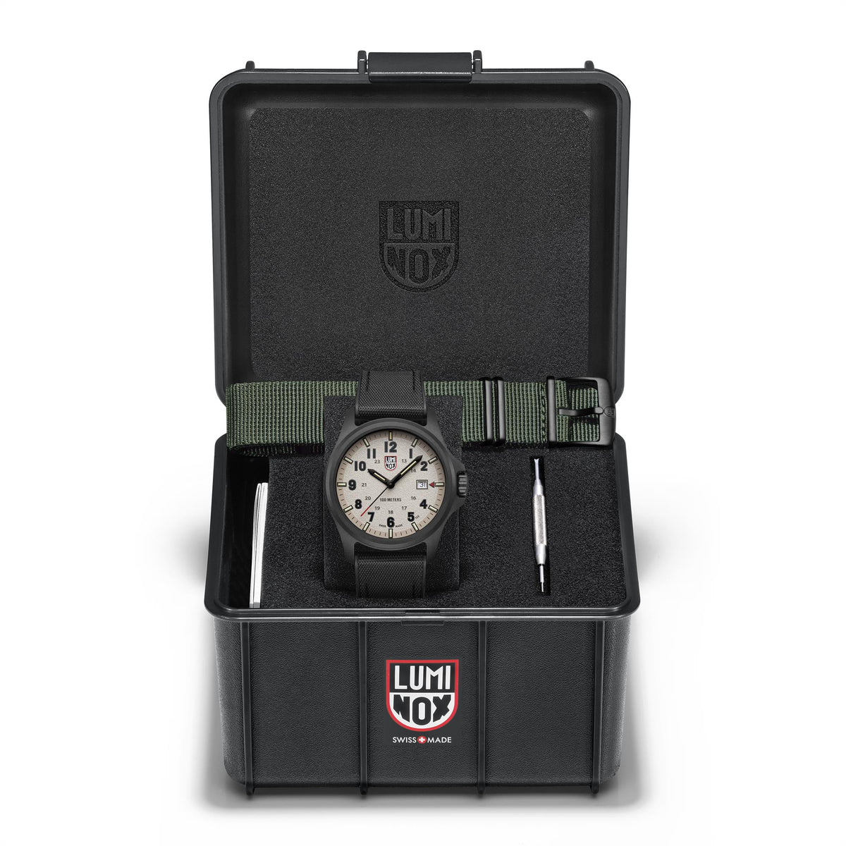 Men's quartz field watch in open case, grey dial, dark textile strap, included tool