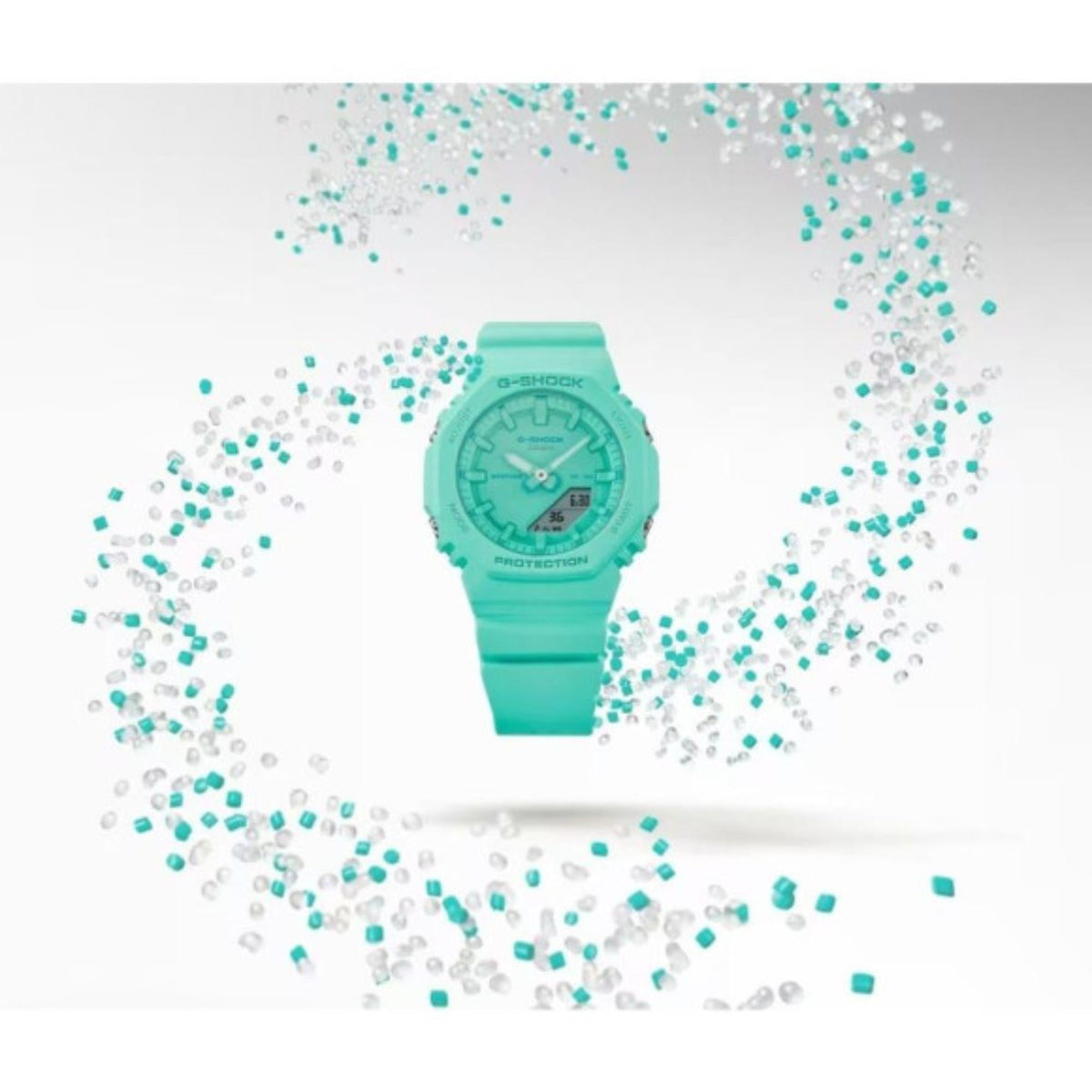 Turquoise resin watch with green dial, analog hands, and digital display on matching strap.
