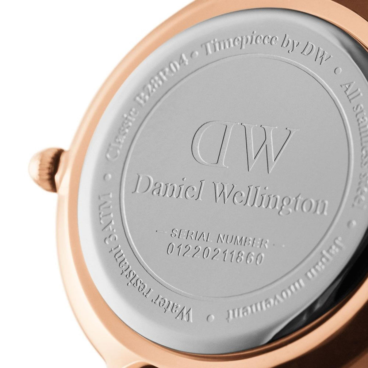 Daniel Wellington quartz watch case back with engraved DW and serial number