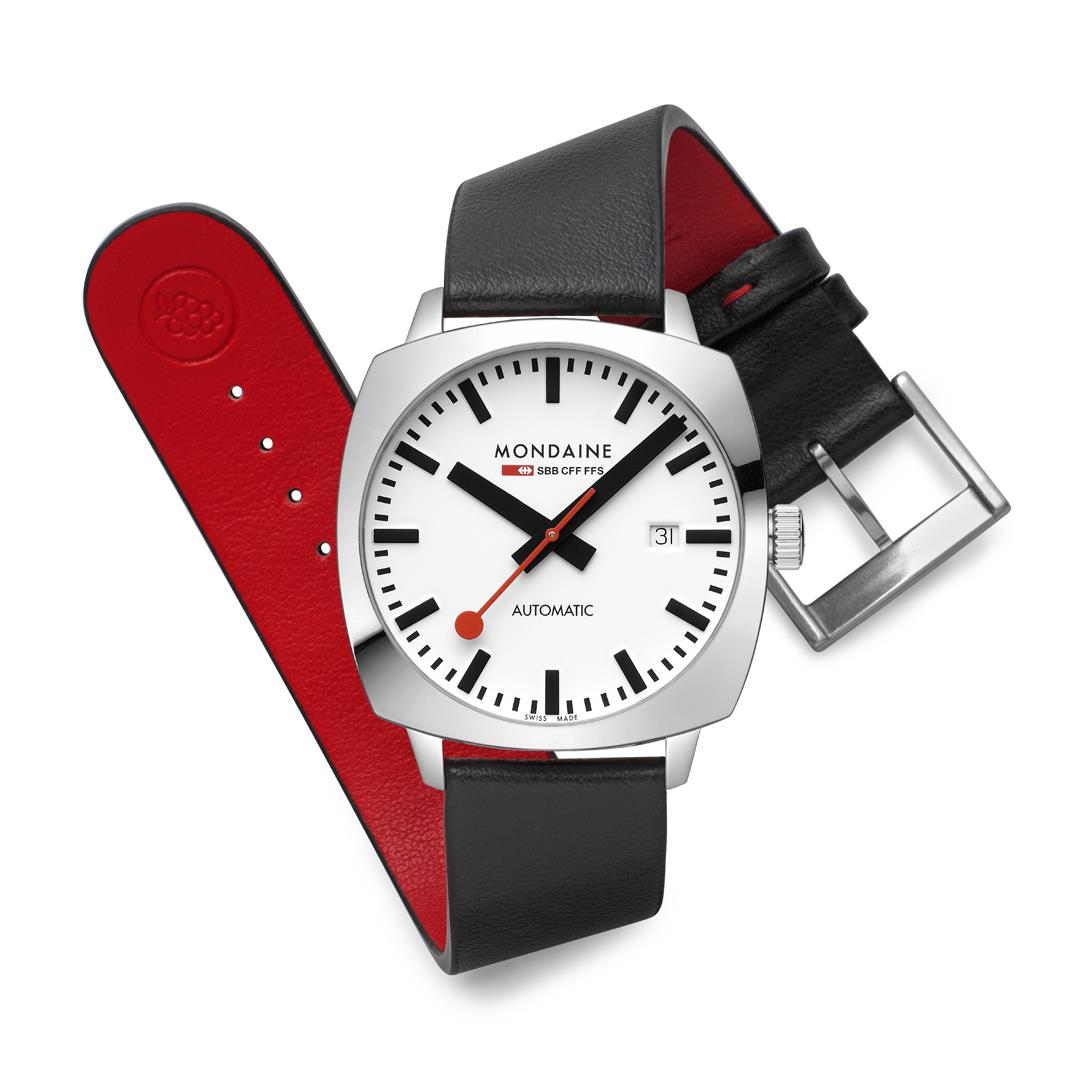 Mondaine Cushion automatic watch with white dial and black leather strap, red strap lining