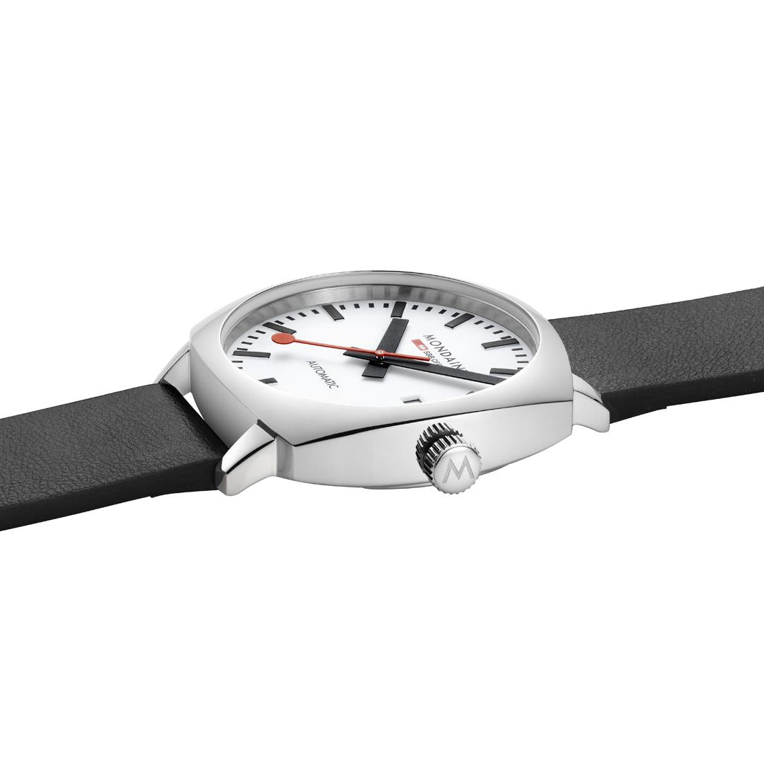 Mondaine Cushion watch with white dial, black leather strap, silver case and side profile crown