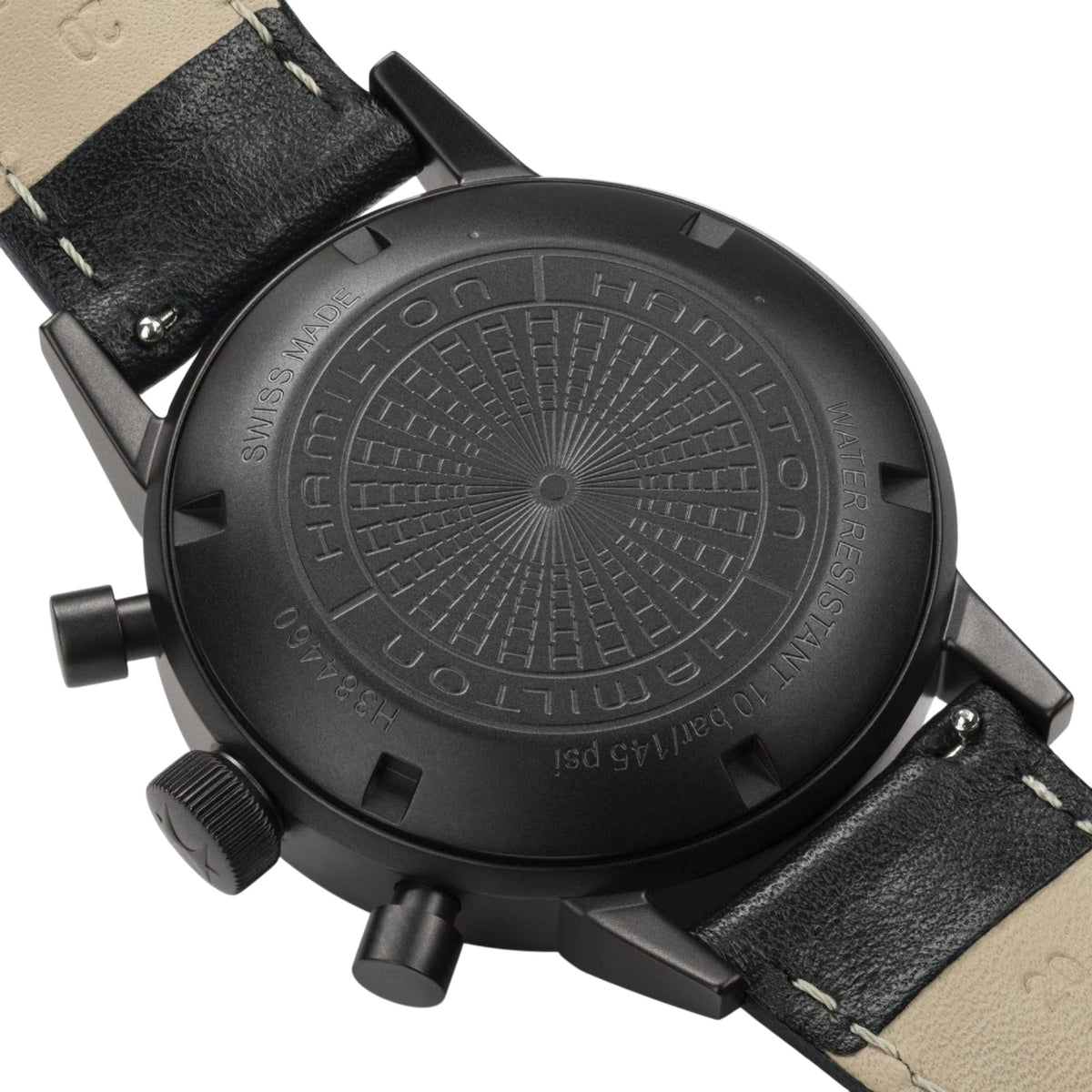 Black dial chronograph watch with black leather strap, round case and pushers