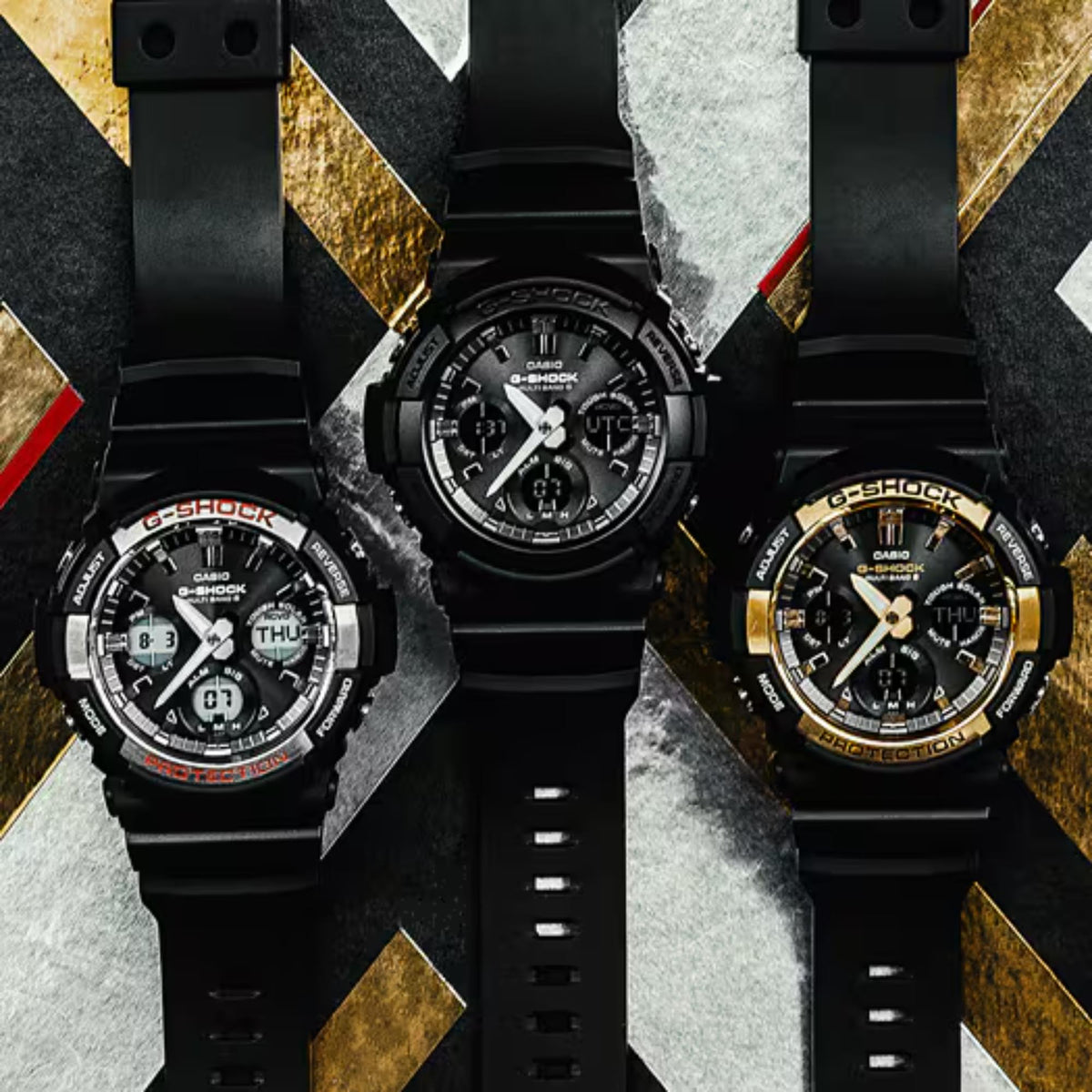Three G-Shock watches with black resin straps and multi-function analog-digital dials