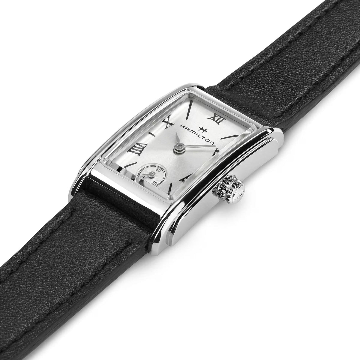 Ladies quartz watch viewed from the side: black leather strap and silver rectangular case.