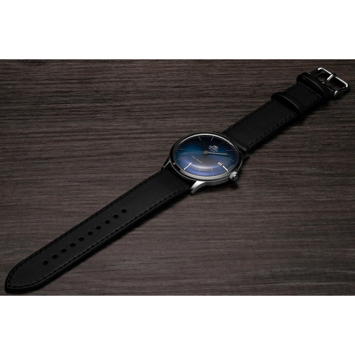 Men's automatic watch on black leather strap with blue dial, silver case
