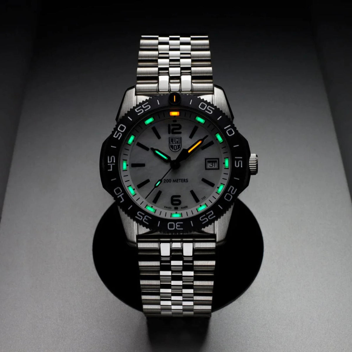 Luminox diver watch with black dial, luminous markers, and two-tone stainless steel bracelet