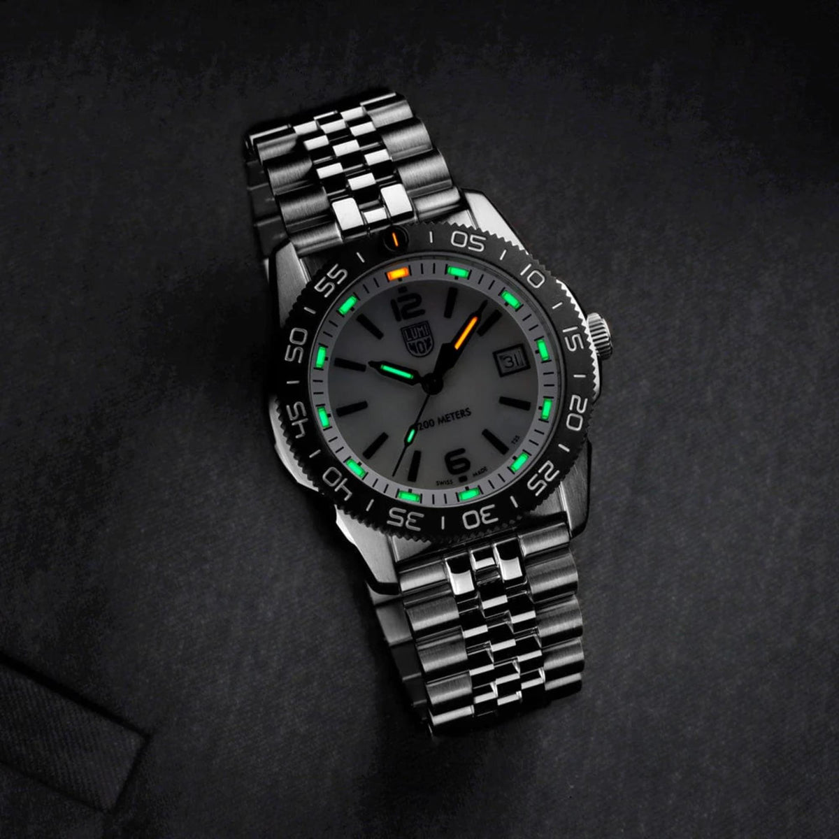 Luminox Pacific diver watch angled view with black dial and luminous green hour markers