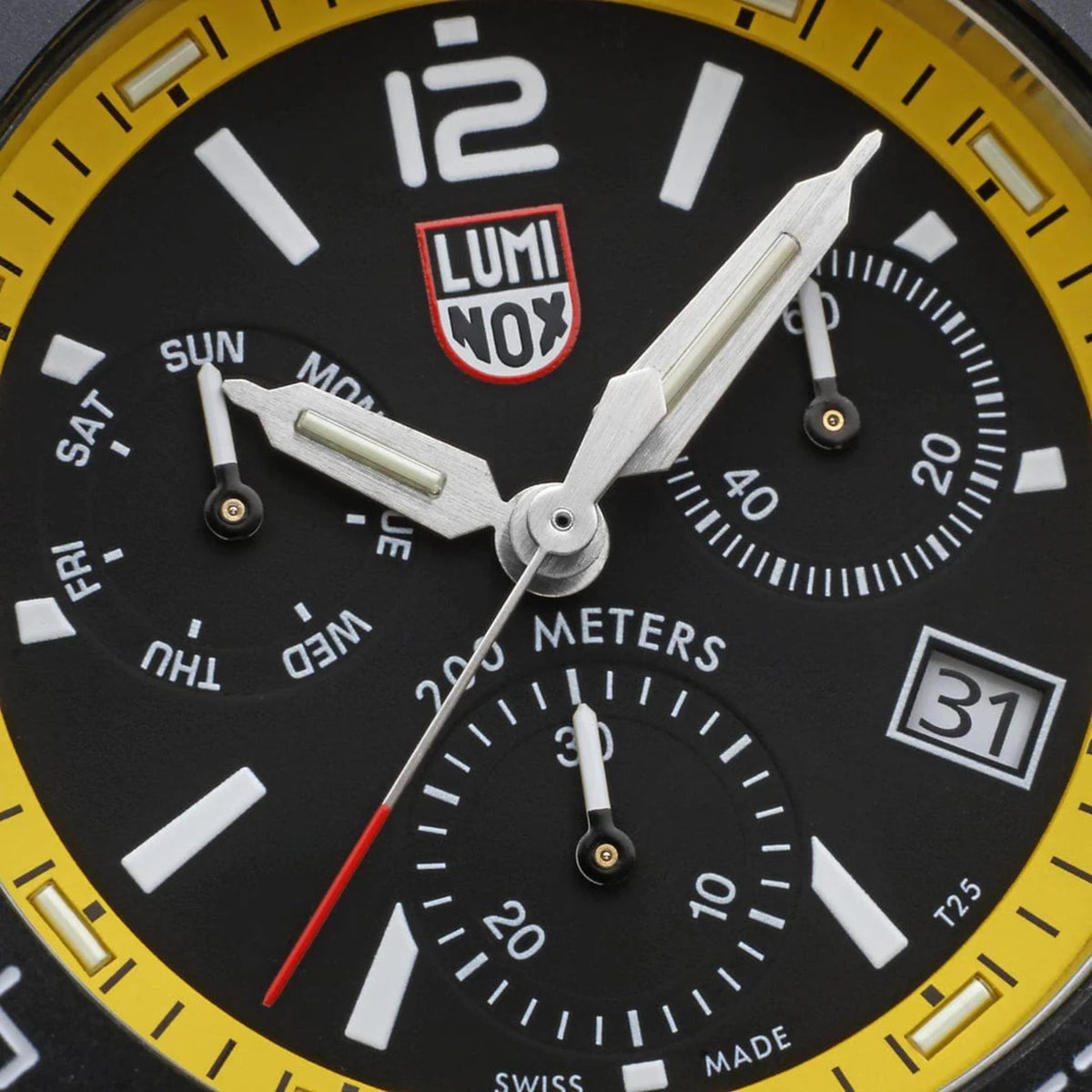 Close-up of the black chronograph dial, sub-dials, and yellow accent ring on the Luminox Pacific Diver XS.3145.M