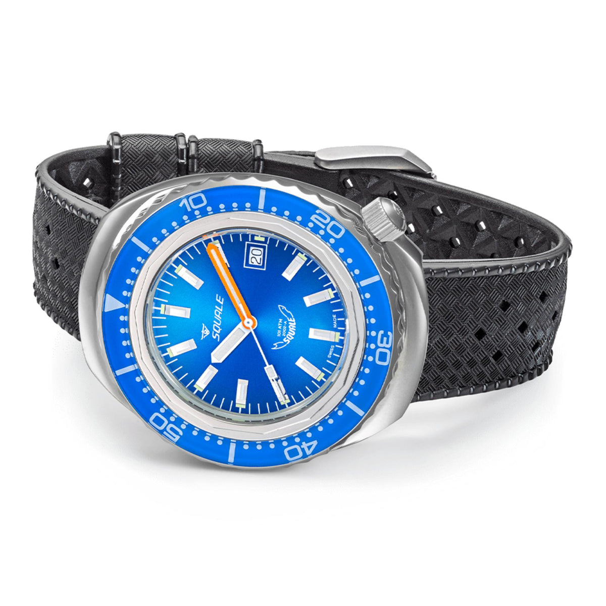 Men's watch with blue dial and blue bezel on black textured rubber strap, angled view
