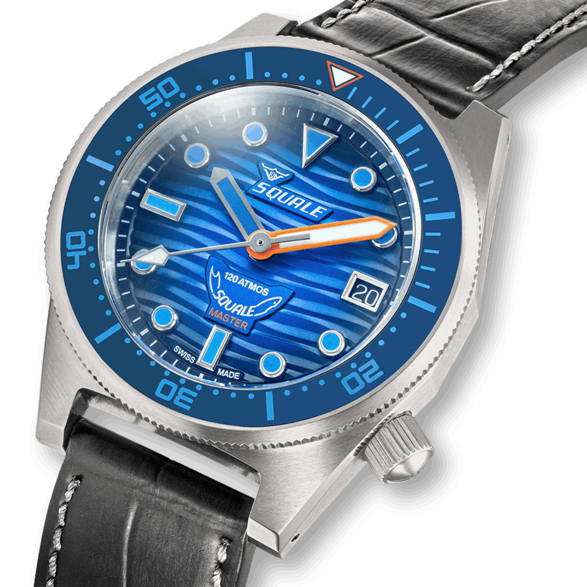Men's automatic watch close-up with bright blue dial, bold indices, and orange hands.