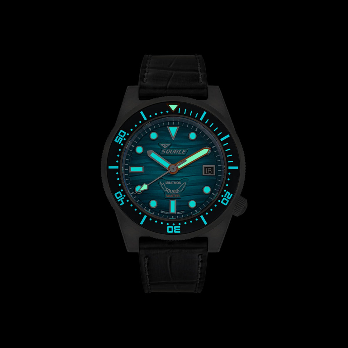 Men's automatic watch with teal dial, orange accents, black leather strap, black case