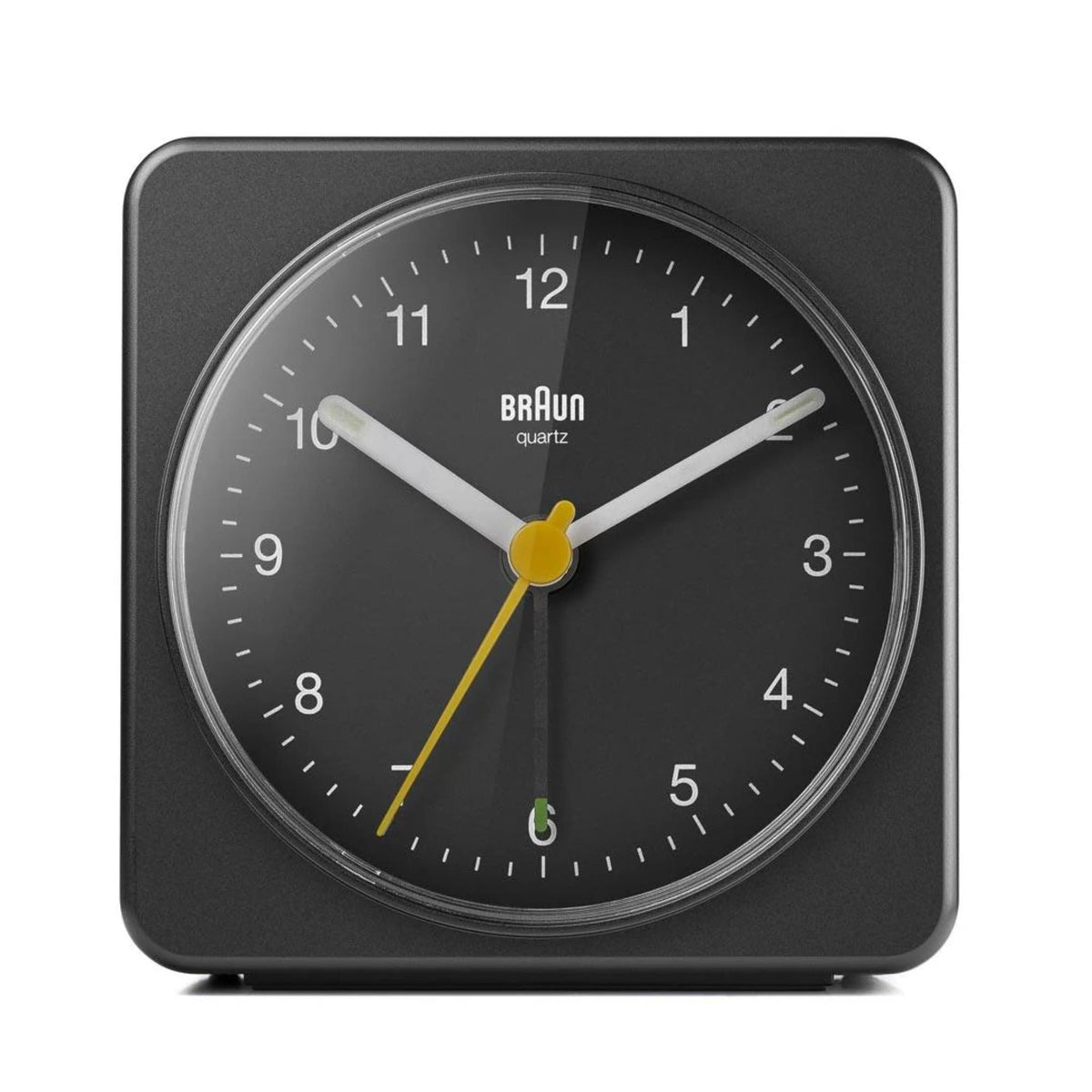 Black Braun quartz alarm clock with yellow hands and white minute markers, gray bezel