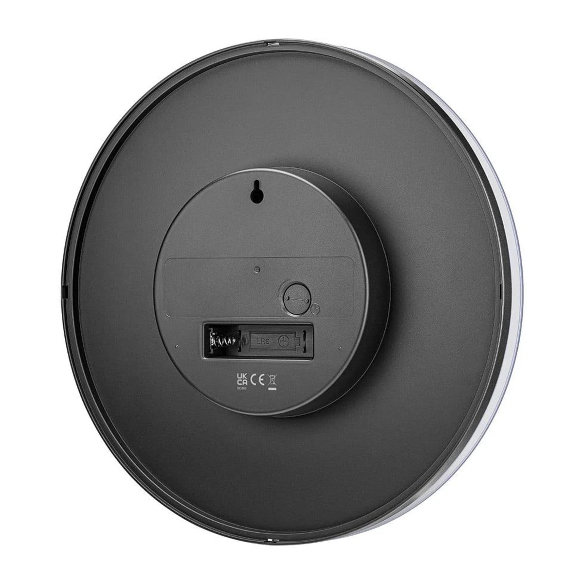 Back of a black wall clock with battery compartment and hanging keyhole