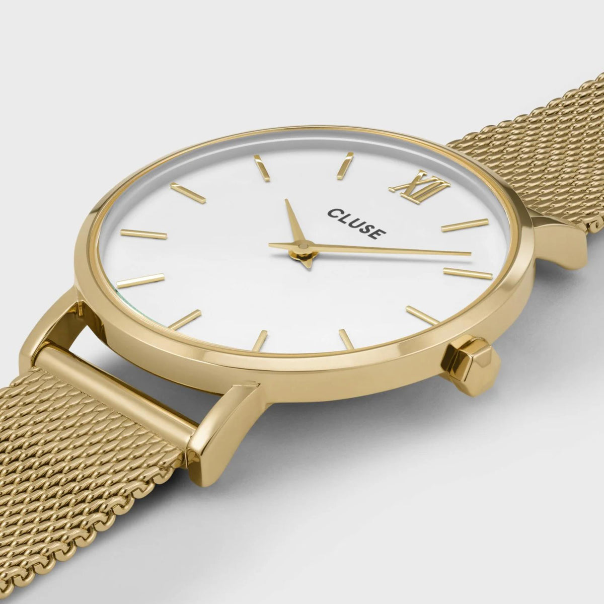 Gold-tone women’s quartz watch with white dial and mesh strap, gold hands and hour markers