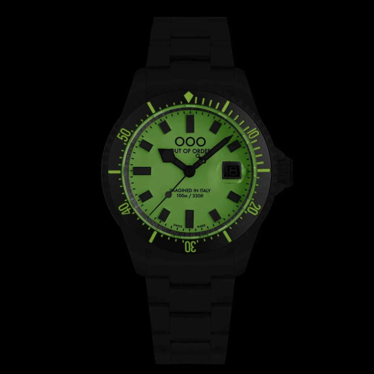 Men's black silicone strap watch with glowing green dial and distressed markers