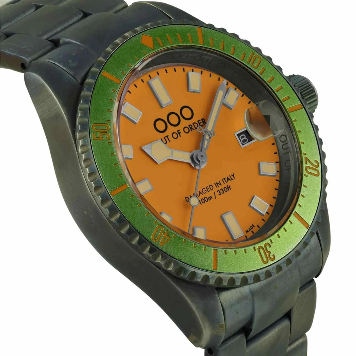 Men's watch close-up: orange dial, green bezel ring, rectangular hour markers