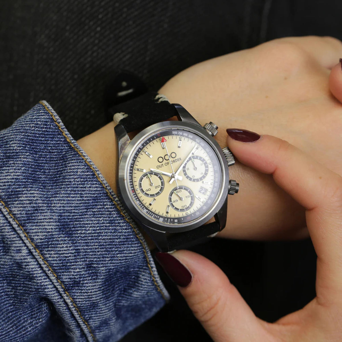 Women’s sporty quartz chronograph watch with black leather strap and cream dial