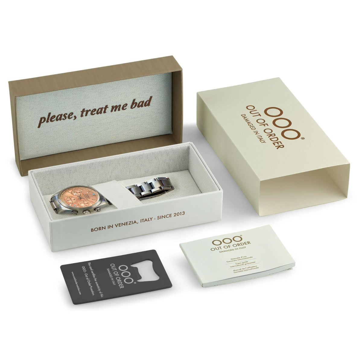 Watch packaging set with open box, inserts, and information cards