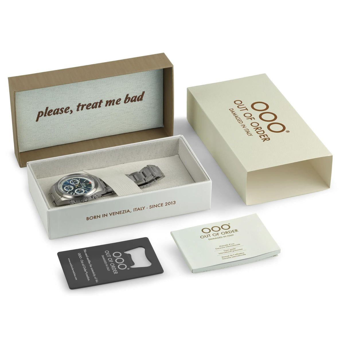 Out of Order watch in open box with booklet cards and branded packaging
