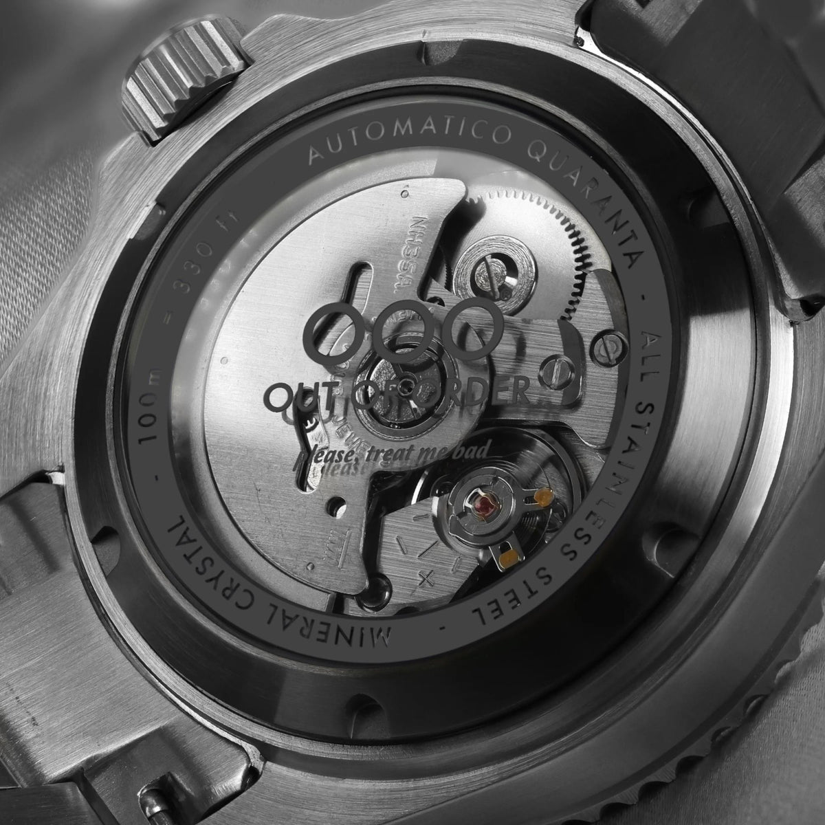 Men's automatic watch caseback close-up with rotating mechanical movement
