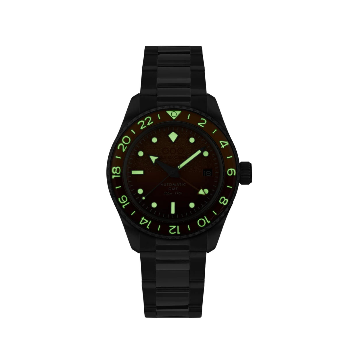 Black dial automatic watch with green luminous markers, steel case, black link band