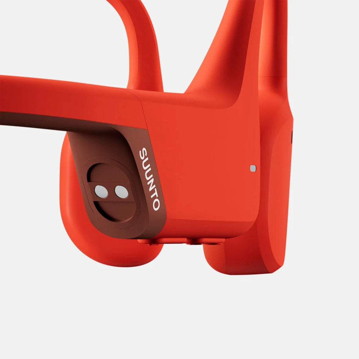 Suunto Sonic Coral Red SS050948000 close-up view of magnetic charging pins and side buttons