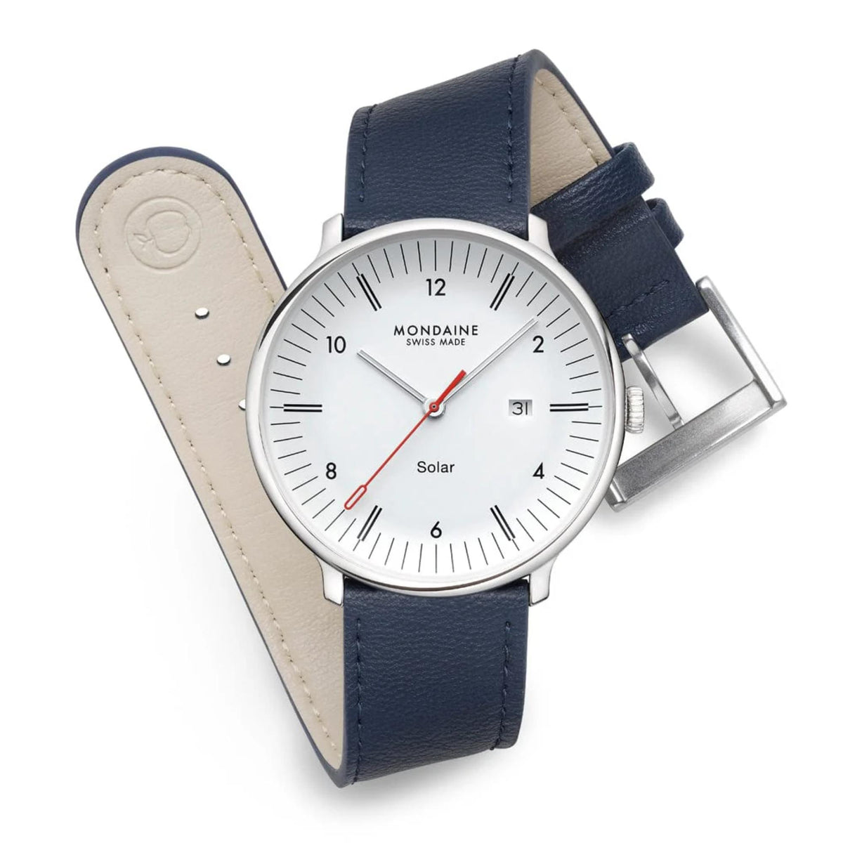 Mondaine watch with the blue leather strap loosely curved to display its cream-colored interior lining, showcasing the full white dial, silver steel hardware, and buckle