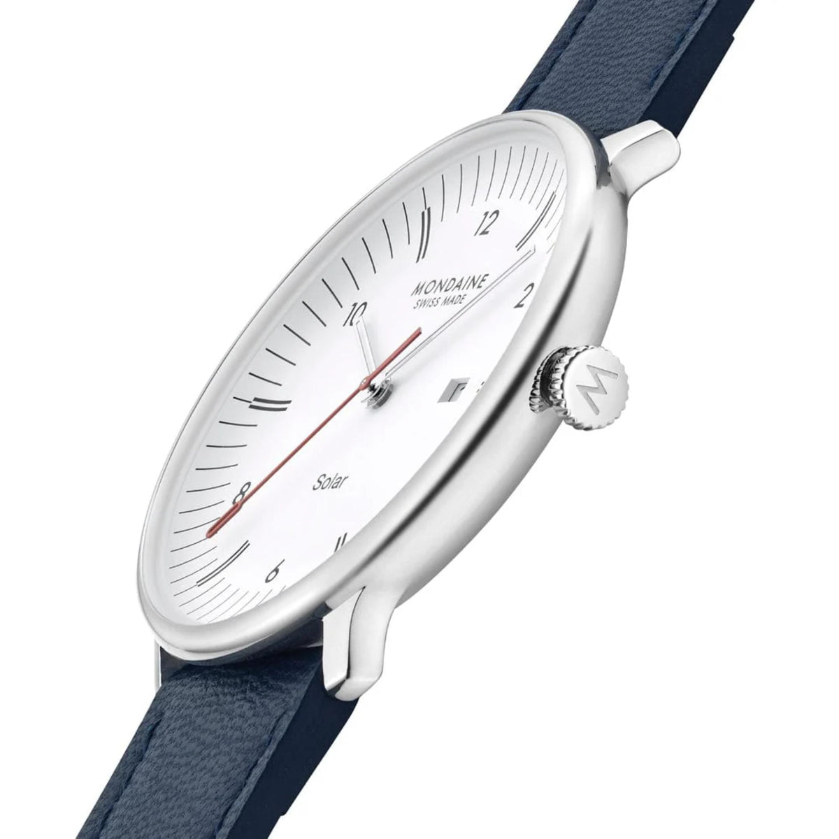 Side view of the Mondaine watch at an angle against a white background, showcasing the slim silver stainless steel case, the crown engraved with the 'M' logo, and the blue textured leather strap extending outward