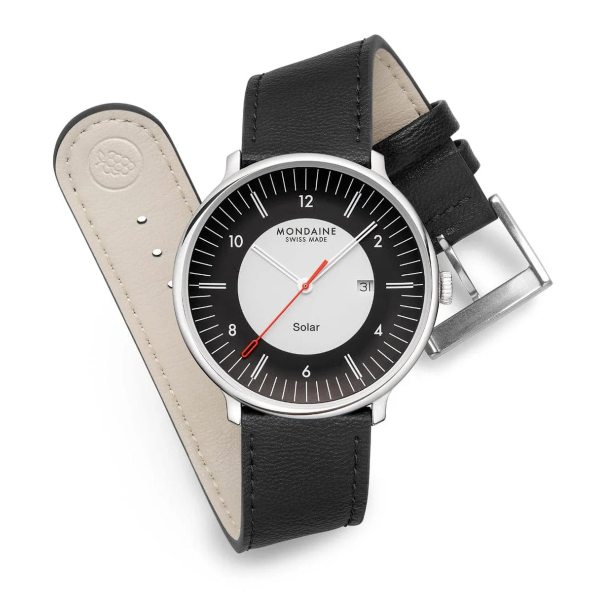 Flat-lay arrangement of Mondaine Doppio watch with the black leather strap loosely curved to display the interior lining, embossed logo, and silver buckle