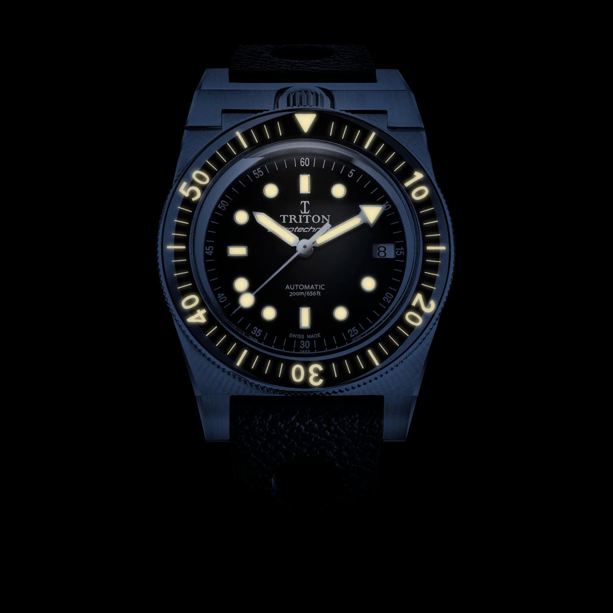 Men's blue dial dive watch with steel bezel and blue rubber strap