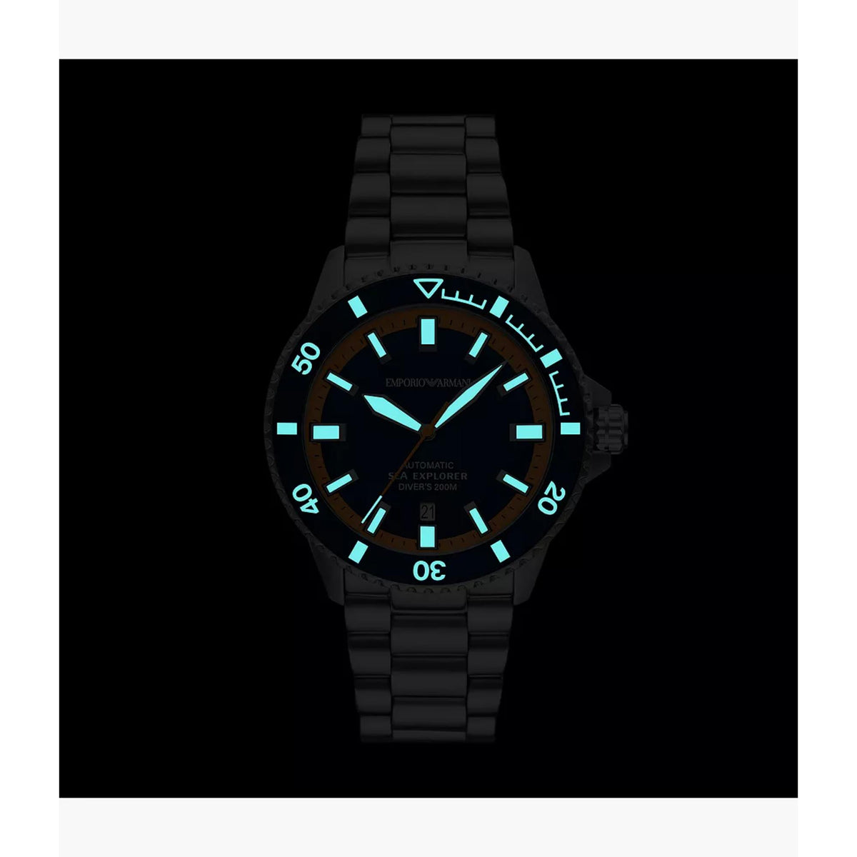 Dark view showcasing luminescent hands, hour markers, and bezel pip on the Emporio Armani Sea Explorer AR60090 timepiece