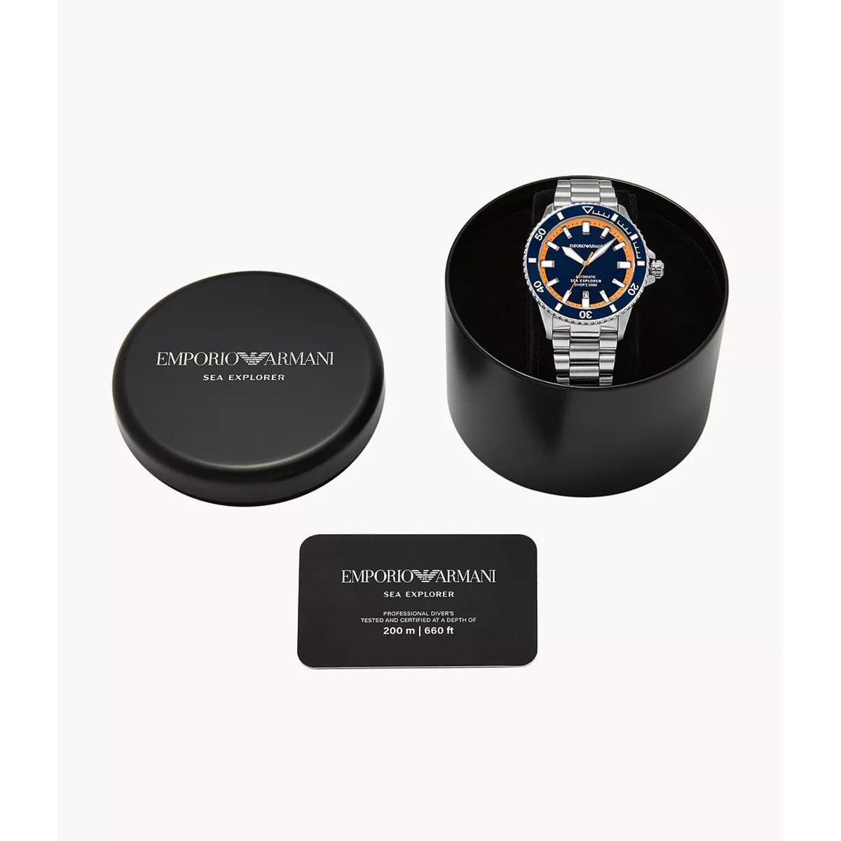Emporio Armani Sea Explorer AR60090 watch presented inside an open black cylindrical case with its guarantee card