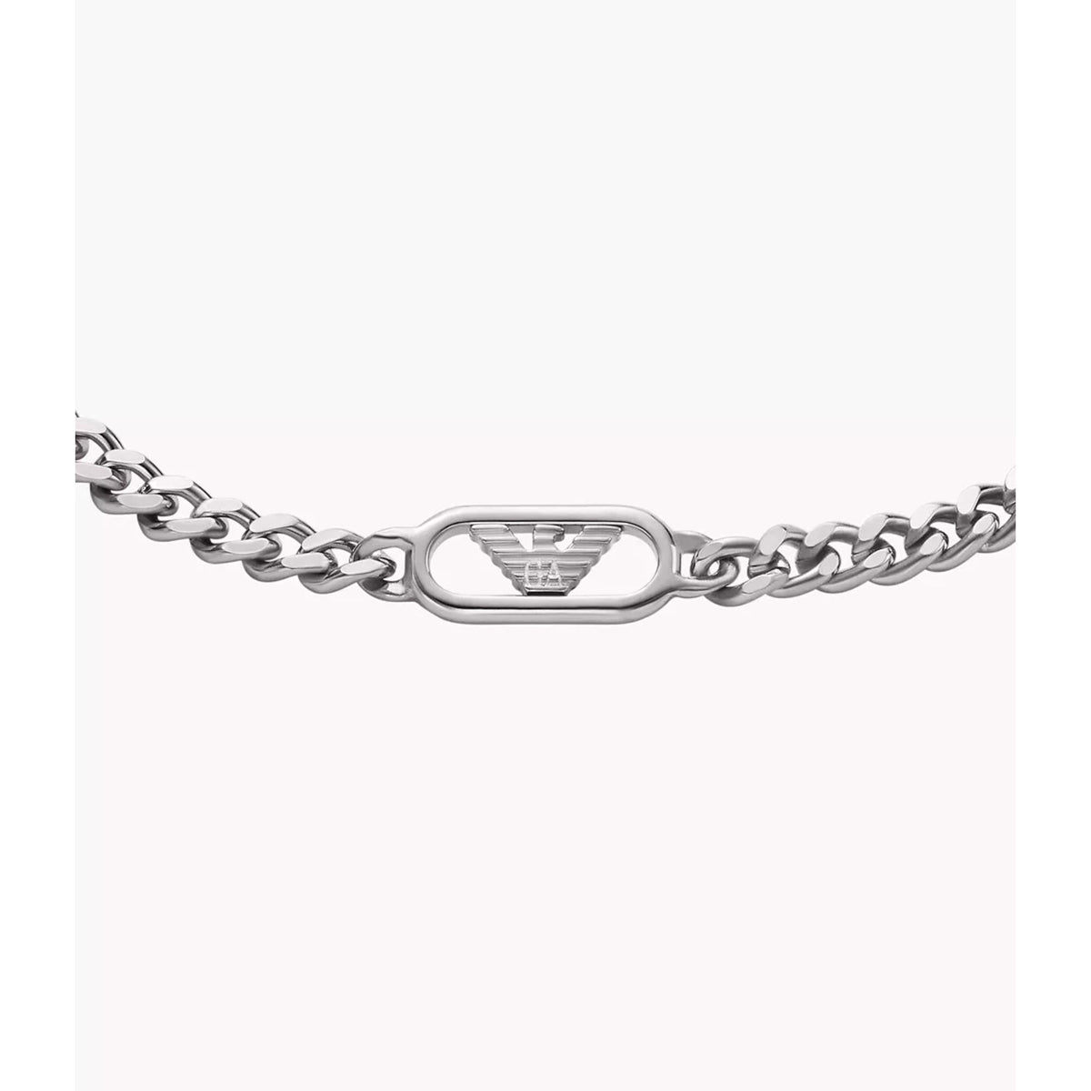 Close-up view of central cutout eagle logo emblem on Emporio Armani mens stainless steel bracelet EGS3247040