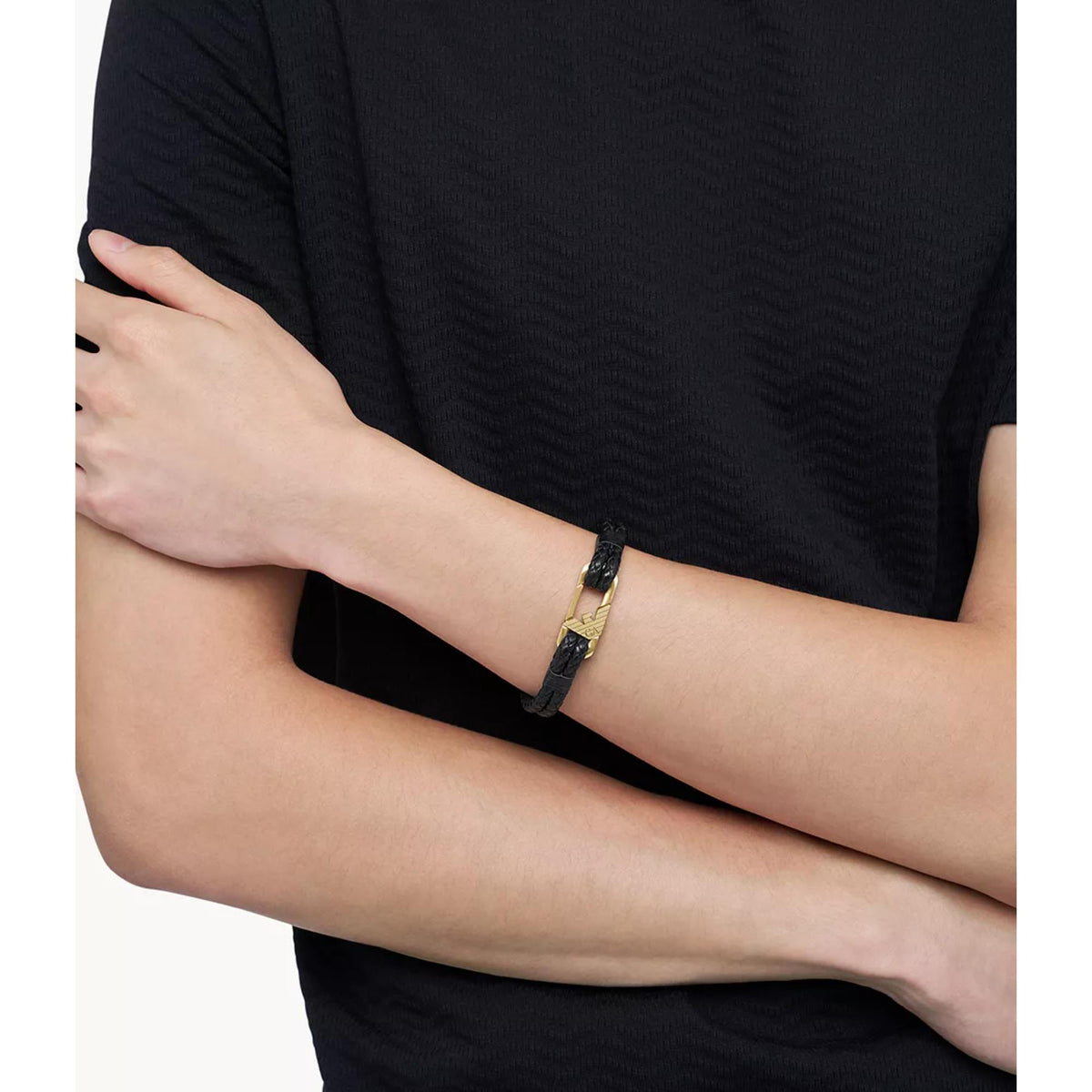 Model wearing Emporio Armani mens braided black leather band EGS3245710 on wrist