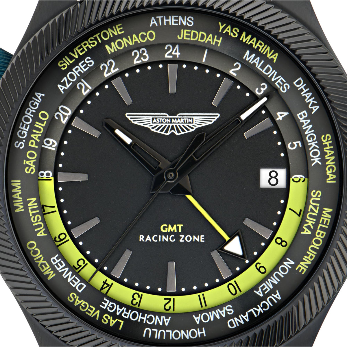 Men's quartz watch with black dial, green GMT accents, textured bezel and baton markers