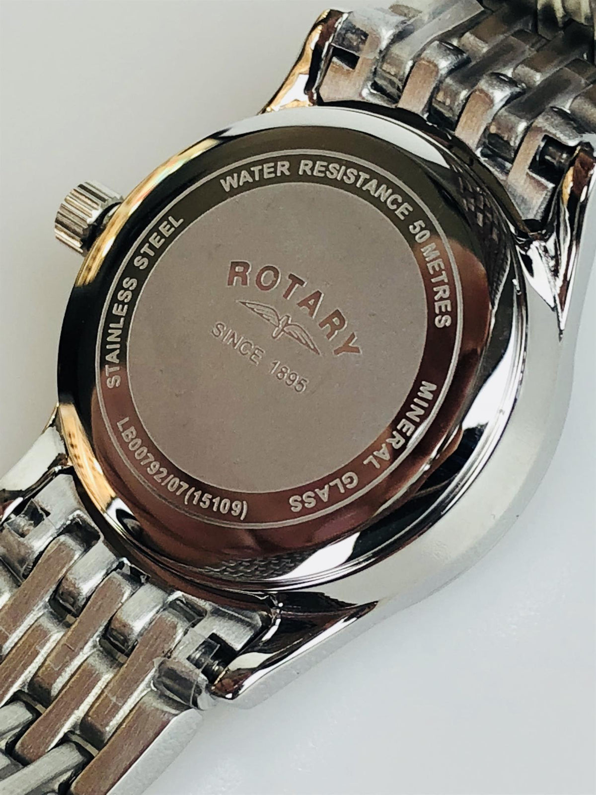 Stainless steel watch case back with water resistance text and Rotary branding