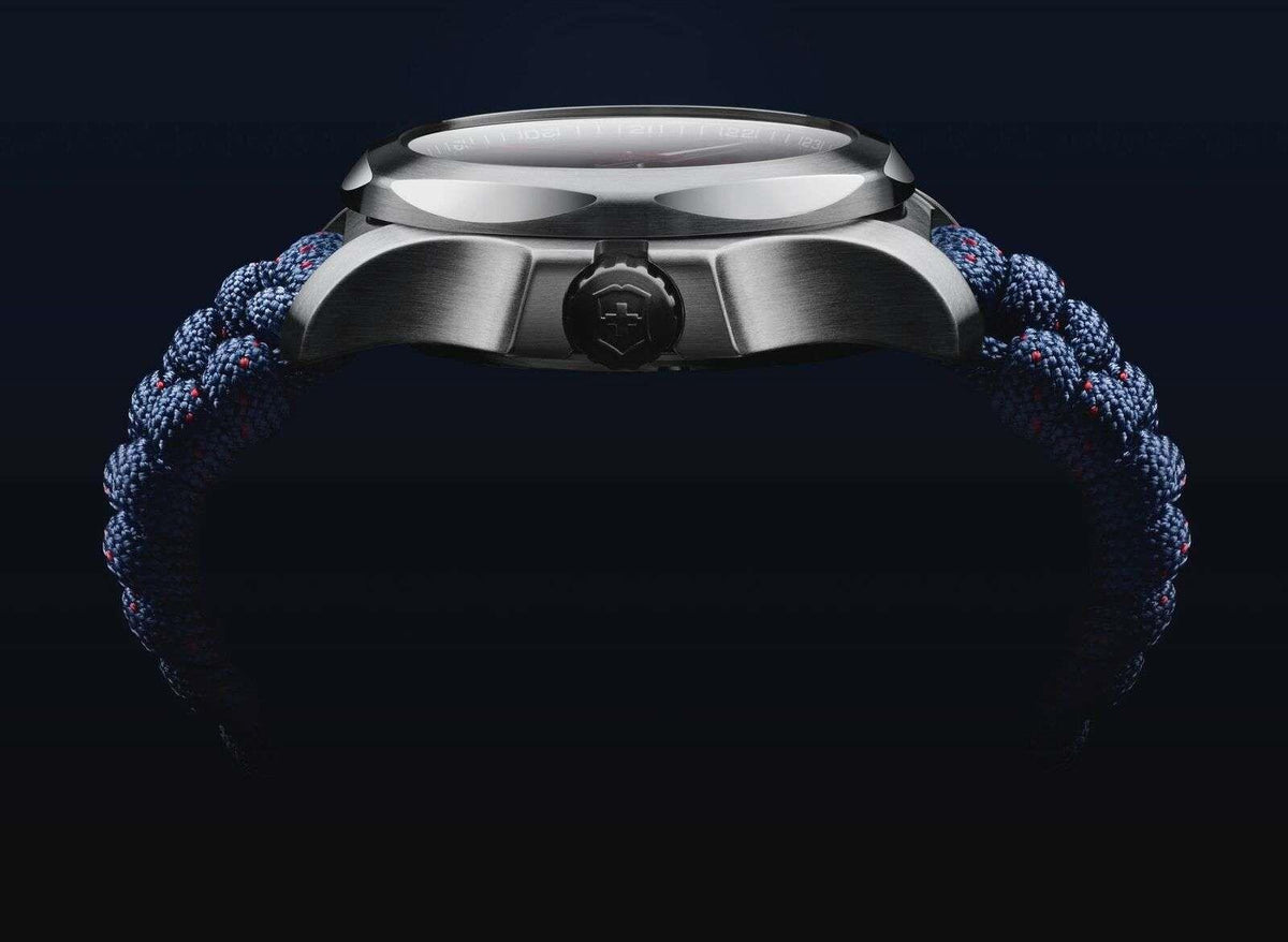 Victorinox I.N.O.X watch case top with black crown detail and blue paracord strap