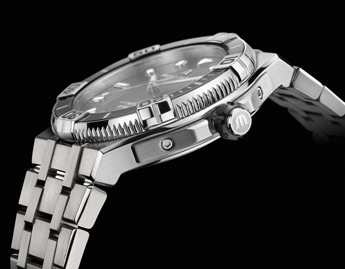 Stainless steel men's automatic watch with black dial, angled side view of crown and case