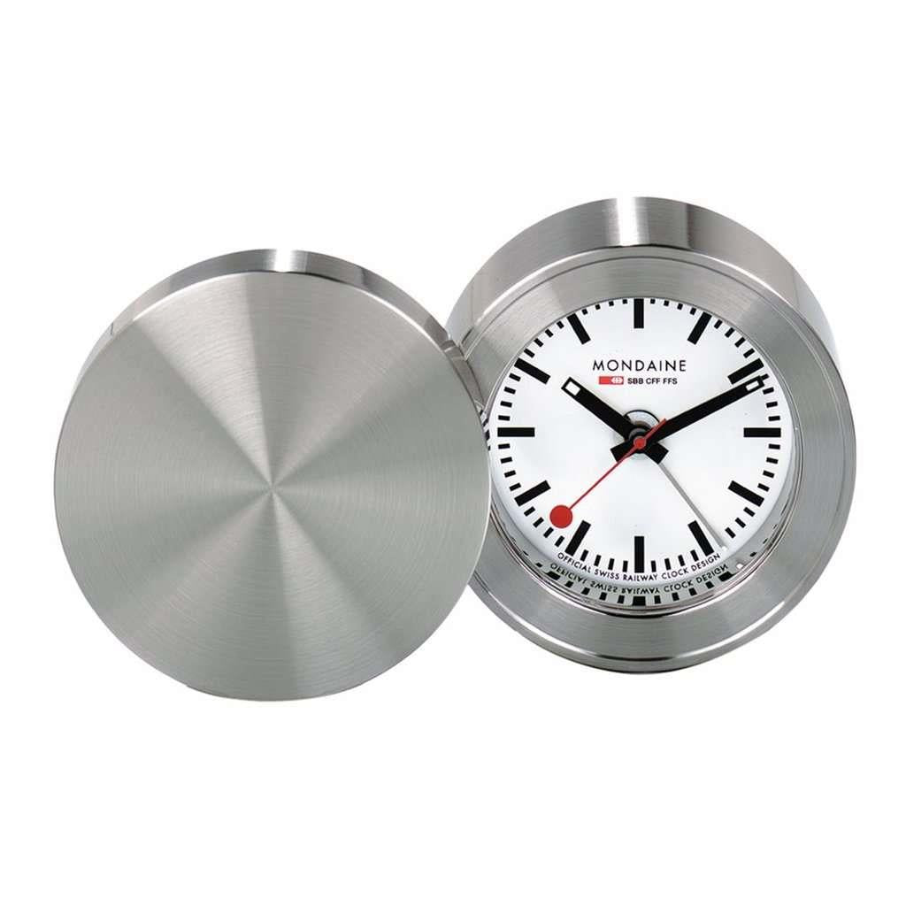 Mondaine quartz alarm clock with open brushed-silver cover, white dial and black hands