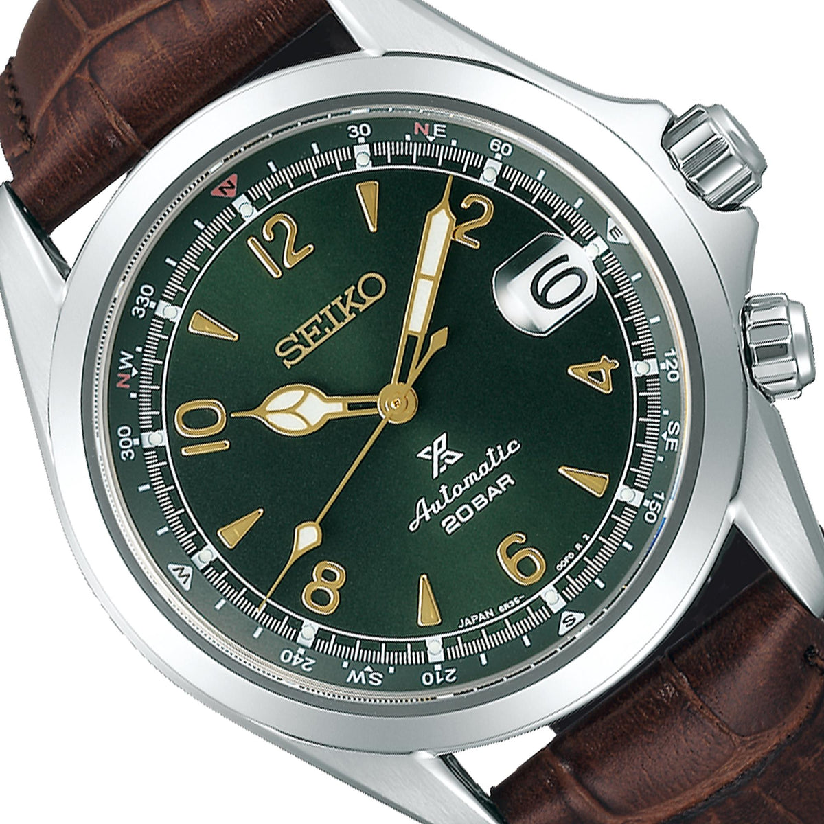 Seiko Prospex Alpinist watch close-up: dark green dial with gold hands and markers