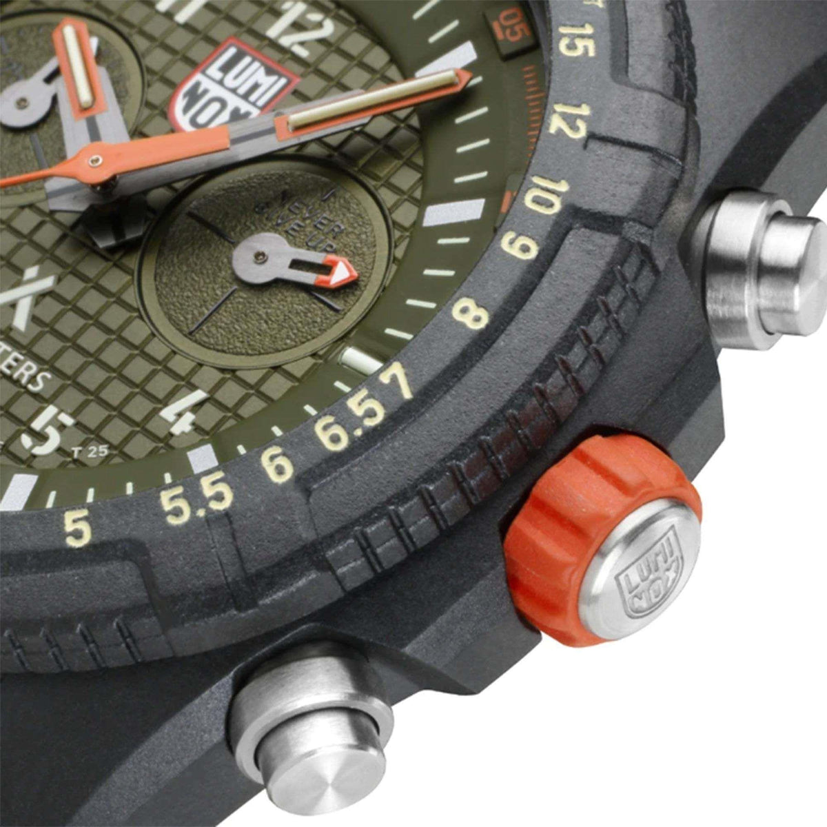 Watch case side with orange push button, metal crown, and dark green dial markings