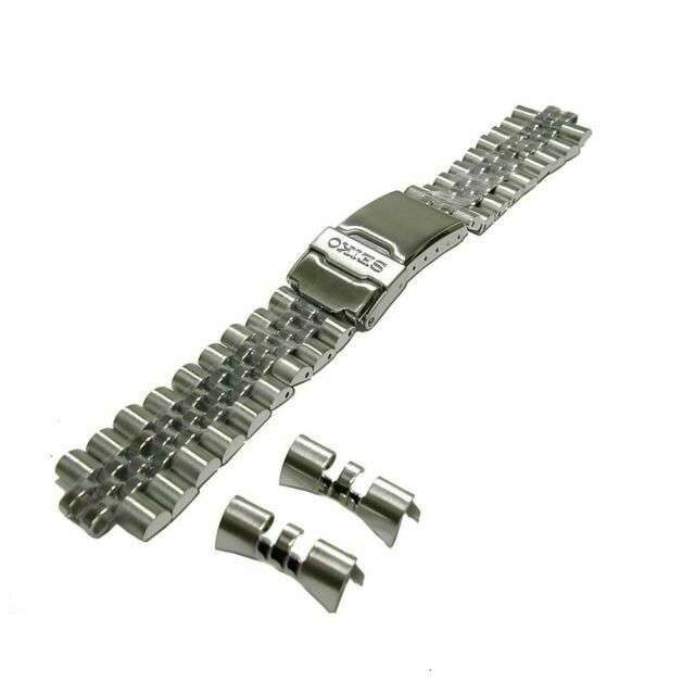 Stainless steel watch bracelet with jubilee links and deployed clasp hardware, end stems