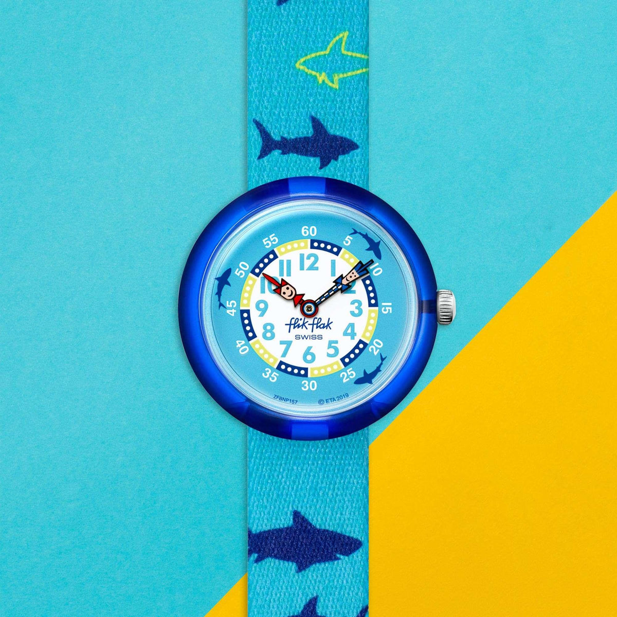 Flik Flak kids quartz watch on blue strap, round dial with shark-themed markers