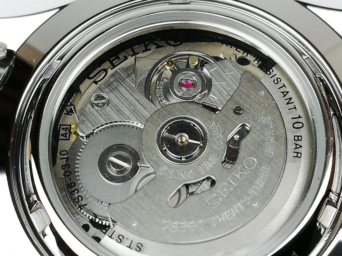 Seiko men’s automatic watch caseback showing engraved movement and water resistance text