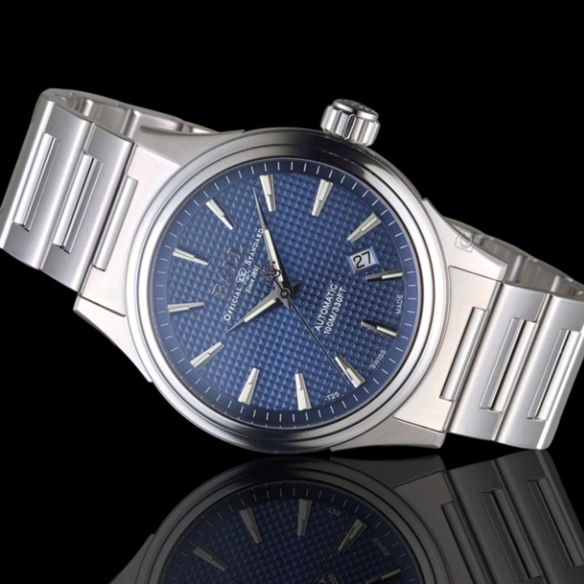 Angled stainless steel automatic watch, blue dial with date window and linked bracelet