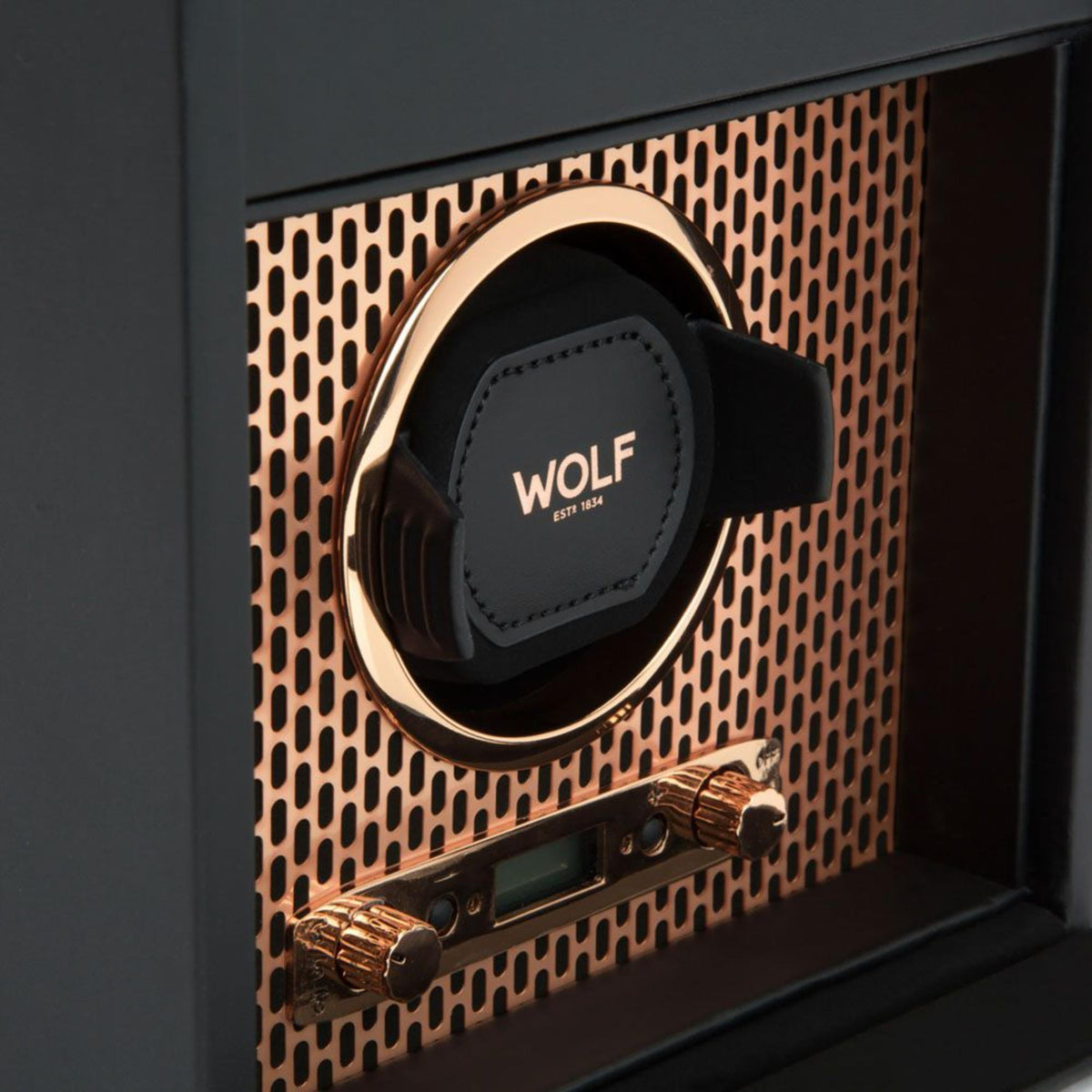 Single watch winder with copper trim, black winder base and WOLF label