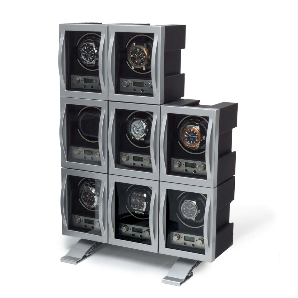 Stack of multiple grey single watch winders arranged in rows with clear front windows